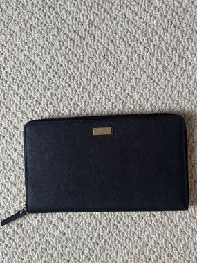 kate spade Black Zip-Around Continental Wallet with Gold Logo